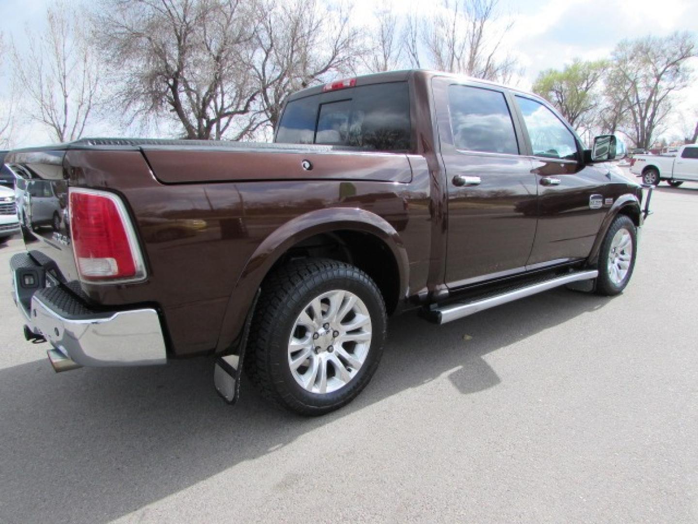 2013 Western Brown /Cattle Tan Leather RAM 1500 Laramie Longhorn (1C6RR7PT9DS) with an 5.7 Hemi V8 engine engine, 8 speed automatic transmission, located at 4562 State Avenue, Billings, MT, 59101, (406) 896-9833, 45.769516, -108.526772 - 2013 RAM 1500 Laramie Longhorn Edition Crew Cab SWB 4WD - Extremely clean! 5.7L V8 OHV 16V Engine - 8 speed automatic transmission - 4WD - 163,381 miles - local trade in - extremely clean Longhorn Edition - climate control - air conditioning - tilt wheel - cruise control - Alpine touchscreen audio - Photo#4